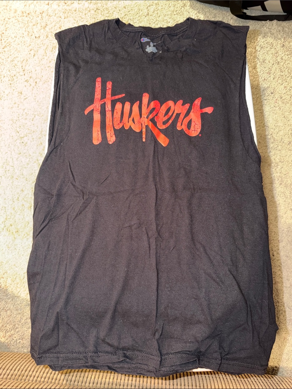 Huskers Black Sleeveless Tee with Red Script cut off